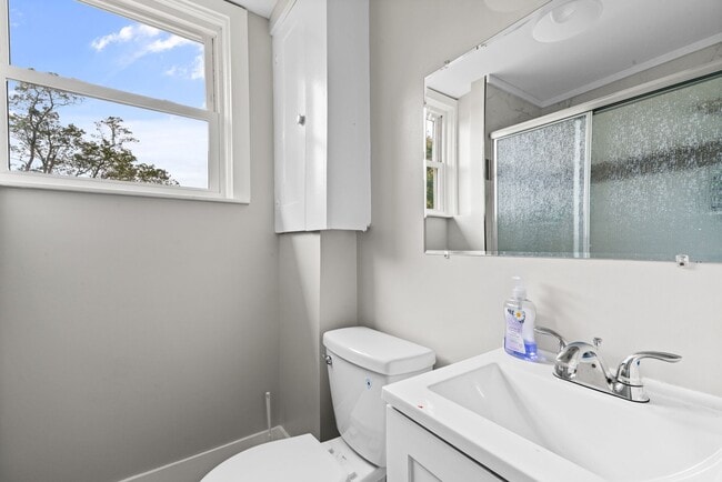 Building Photo - Spacious 3-Bedroom Home with Sunroom & Off-Street Parking in Johnston!