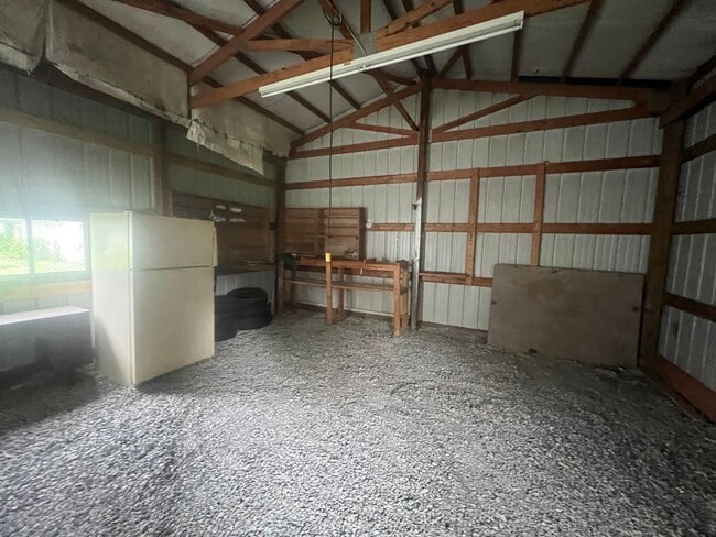 Building Photo - Three bedroom home with XL garage!