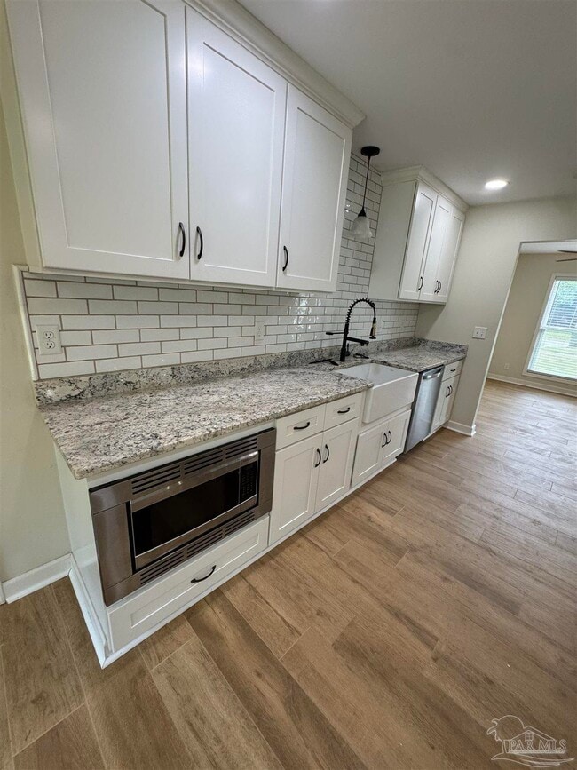 Building Photo - 7866 Apollo Dr