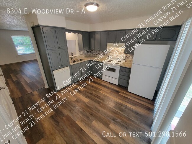 Building Photo - 8304 Woodview Dr N