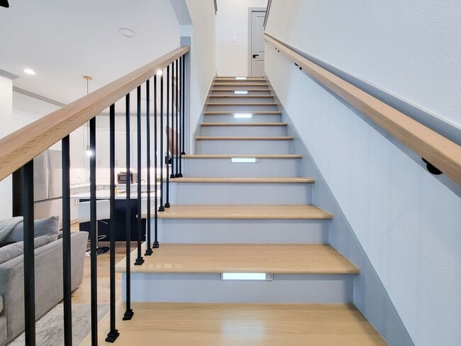 Building Photo - This 4-bedroom, 3-bathroom, two-story residence comes with a generous two-car attached garage. Re...