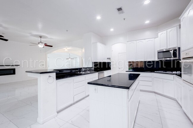 Building Photo - 4 Bedroom/3 Bath Home with Paid Solar - $3295 Per Month!