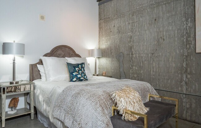 Building Photo - Rare Availability in the Streetcar Lofts, Parking, and Some Utilities Included