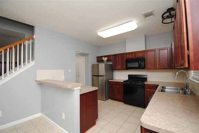 Building Photo - 8319 Greys Ln