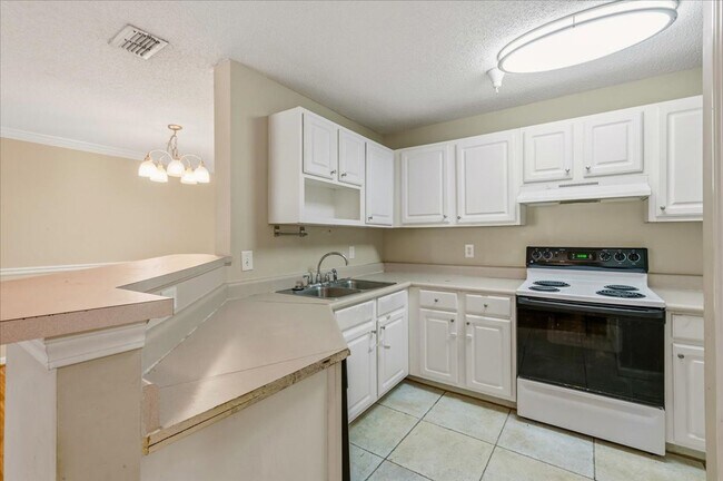 Building Photo - Spacious 3BR Condo in Gated White Marsh Island Community | Resort-Style Amenities | Pet-Friendly