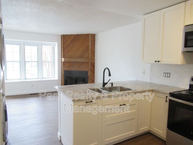 Building Photo - 9617 W Chatfield Ave