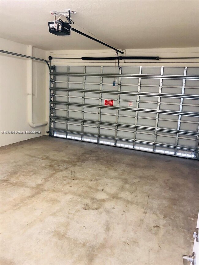 Building Photo - 6667 NW 102nd Path