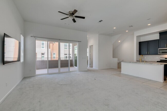 Building Photo - Stunning 4-Level Townhome in Inspirada | R...