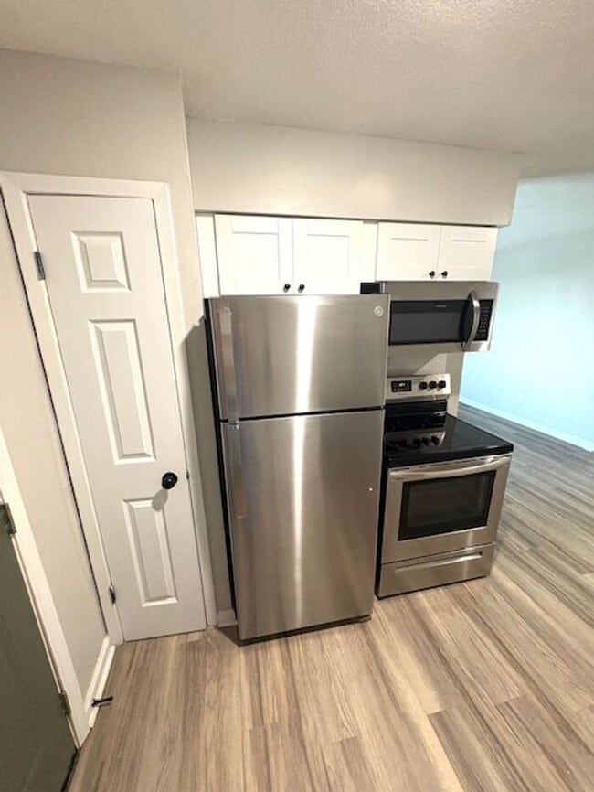 Building Photo - The Den: Where Comfort Meets Community