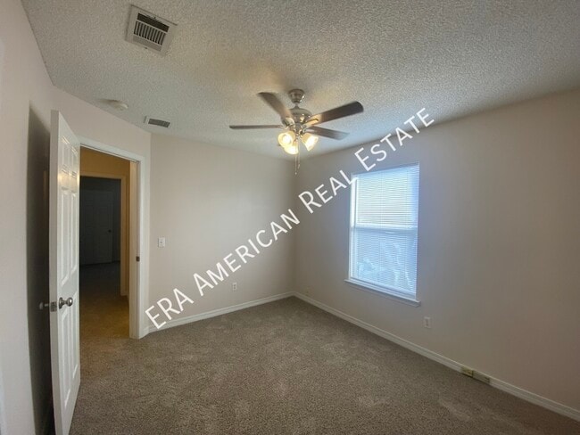 Building Photo - 7418 Woodmont Rd