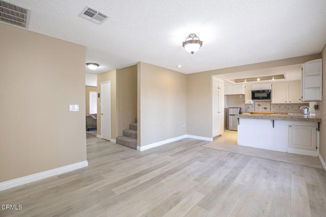 Building Photo - 3831 E Ave T 8