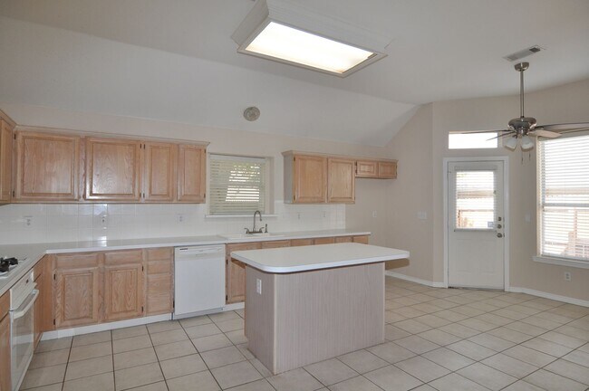 Building Photo - Welcome to this charming 3-2-2 brick home ...