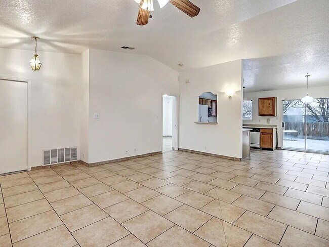 Building Photo - "Spacious 4-Bedroom Gem on Quartz Dr – Your Ideal Albuquerque Retreat!"
