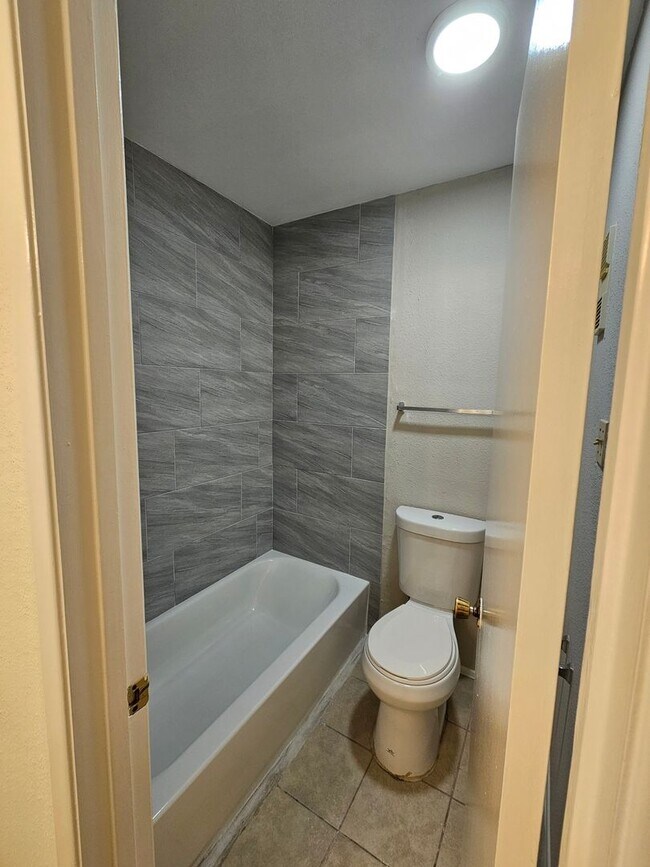 Building Photo - Beautifully Updated 2BR/2BA with Loft Oasis – Safe & Gated Community