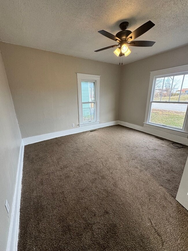 Building Photo - 4 bedroom/1 bath house w/storage building