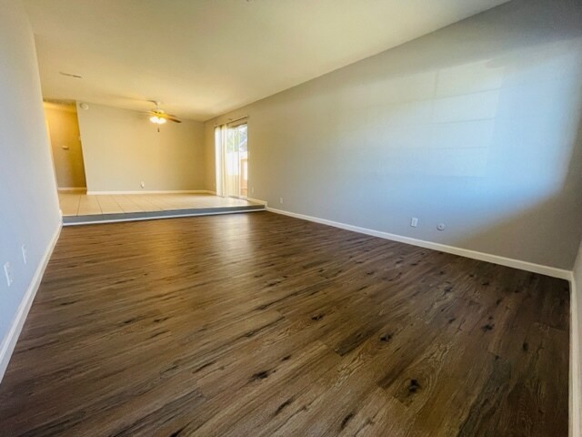 living room has new water proof vinyl flooring - 8164 Valley Green Dr