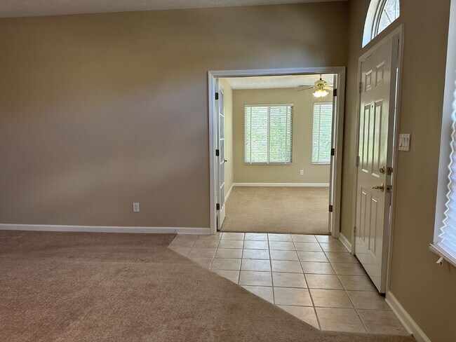 Building Photo - Well-Maintained Condo with 2 Bonus Rooms & Attached 2-Car Garage