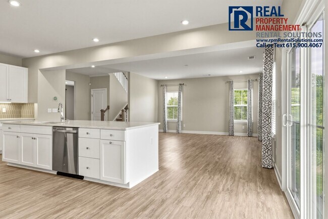 Building Photo - Great 4 bd 2.5 ba with attached garage and large deck!