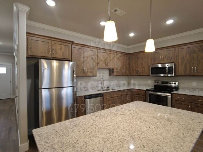 Building Photo - EP 6 | Townhome with Garage in Siloam Springs!