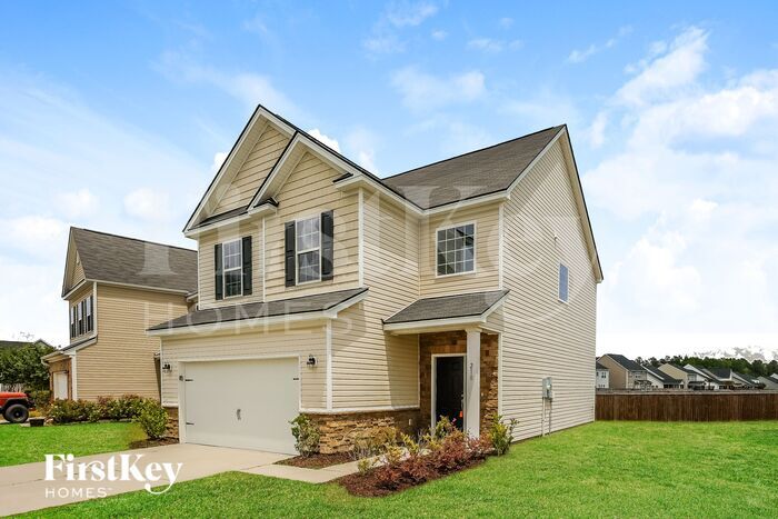 Building Photo - 210 Firewheel Ct