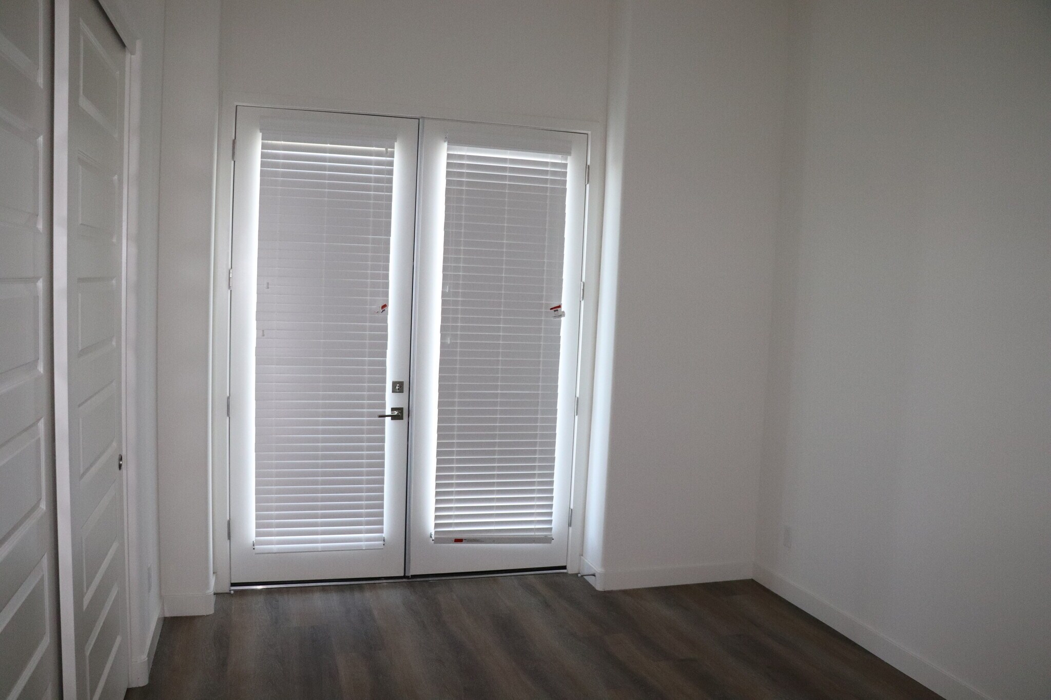 Second Bedroom, with French Doors to Juliet balcony - 11900 N 32nd St
