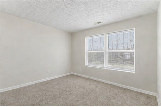 Building Photo - Spacious 2nd Floor Condo in Lithonia, Georgia -- Vouchers Accepted