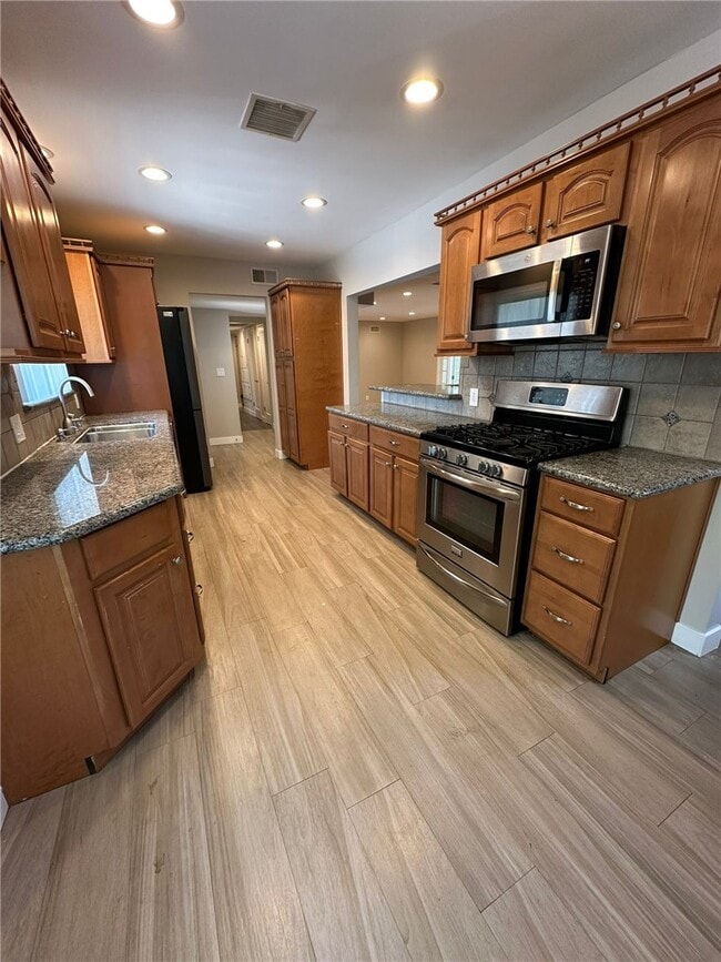 Building Photo - 5741 Larryan Dr