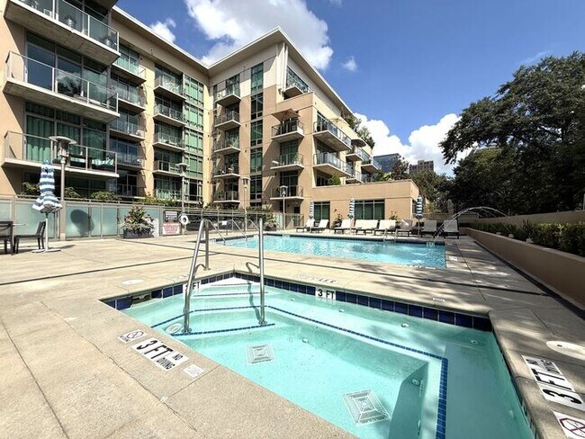 Building Photo - Luxury Midtown 1 Bedroom Condo, Polished Concrete Floors, City Views!