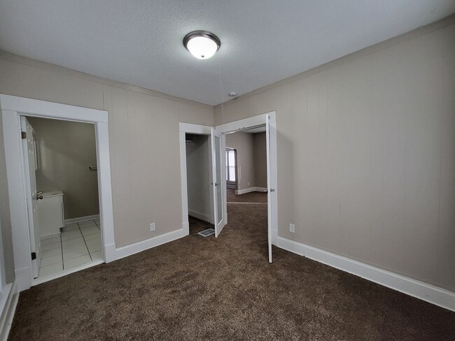 Building Photo - Two bedroom home with partially fenced yard!