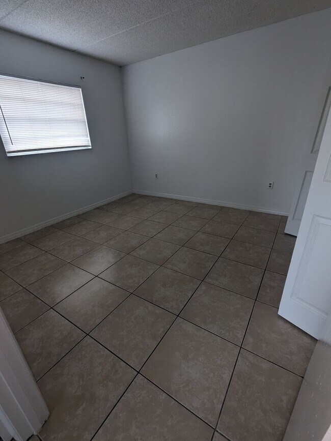 Building Photo - Palm Gardens - First Floor
