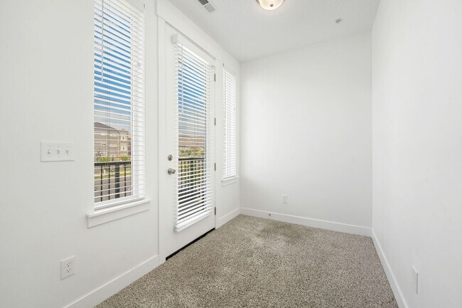 Building Photo - Modern Herriman Condo with Stylish Living & Community Amenities!