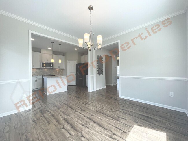 Building Photo - Beautiful End Unit 3 Story 3 bedroom, 3.5 bathroom Townhome with 2 Car-Garage in 540 Townes subdi...