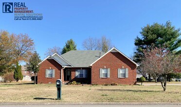 Building Photo - Adorable brick home in a great neighborhood! Huge bonus room and 2 car garage!