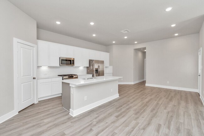 Building Photo - Welcome to the Linden — Effortless Living, All on One Level.