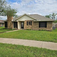 Building Photo - Three bedroom and two bathroom nicely remo...