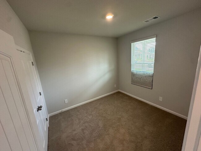 Building Photo - BRAND NEW TOWNHOME!