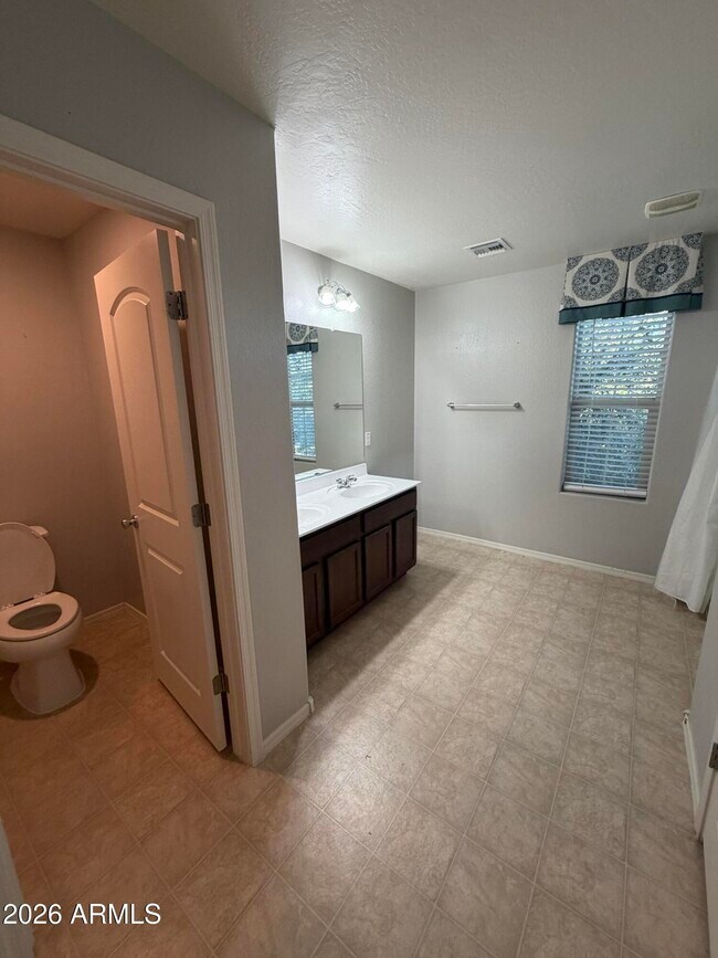 Building Photo - 16576 W Jenan Dr
