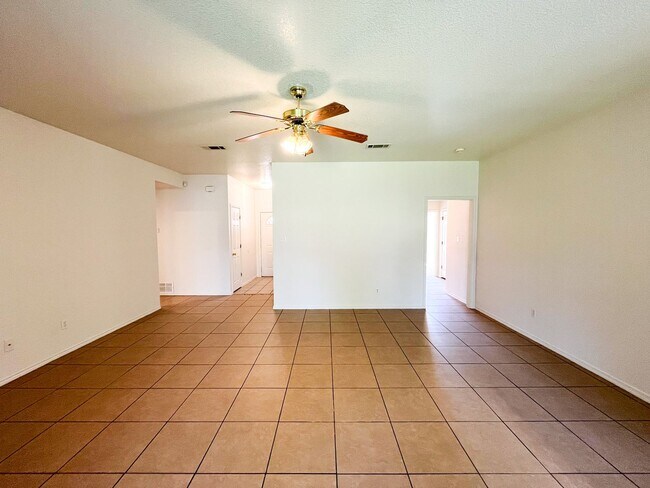 Building Photo - Available NOW!!!! Open floor plan features living room with fireplace, dining area, and large kit...
