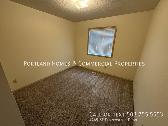 Building Photo - 4469 SE Pennywood Dr