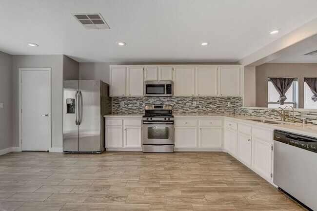Building Photo - Totally Updated Solar Powered 4 Bedroom! Bedroom and Bath Downstairs!