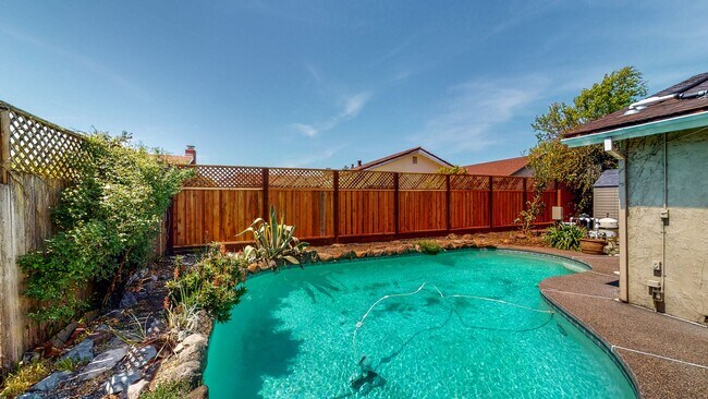 Building Photo - PURE Property Management - Stunning four-b...
