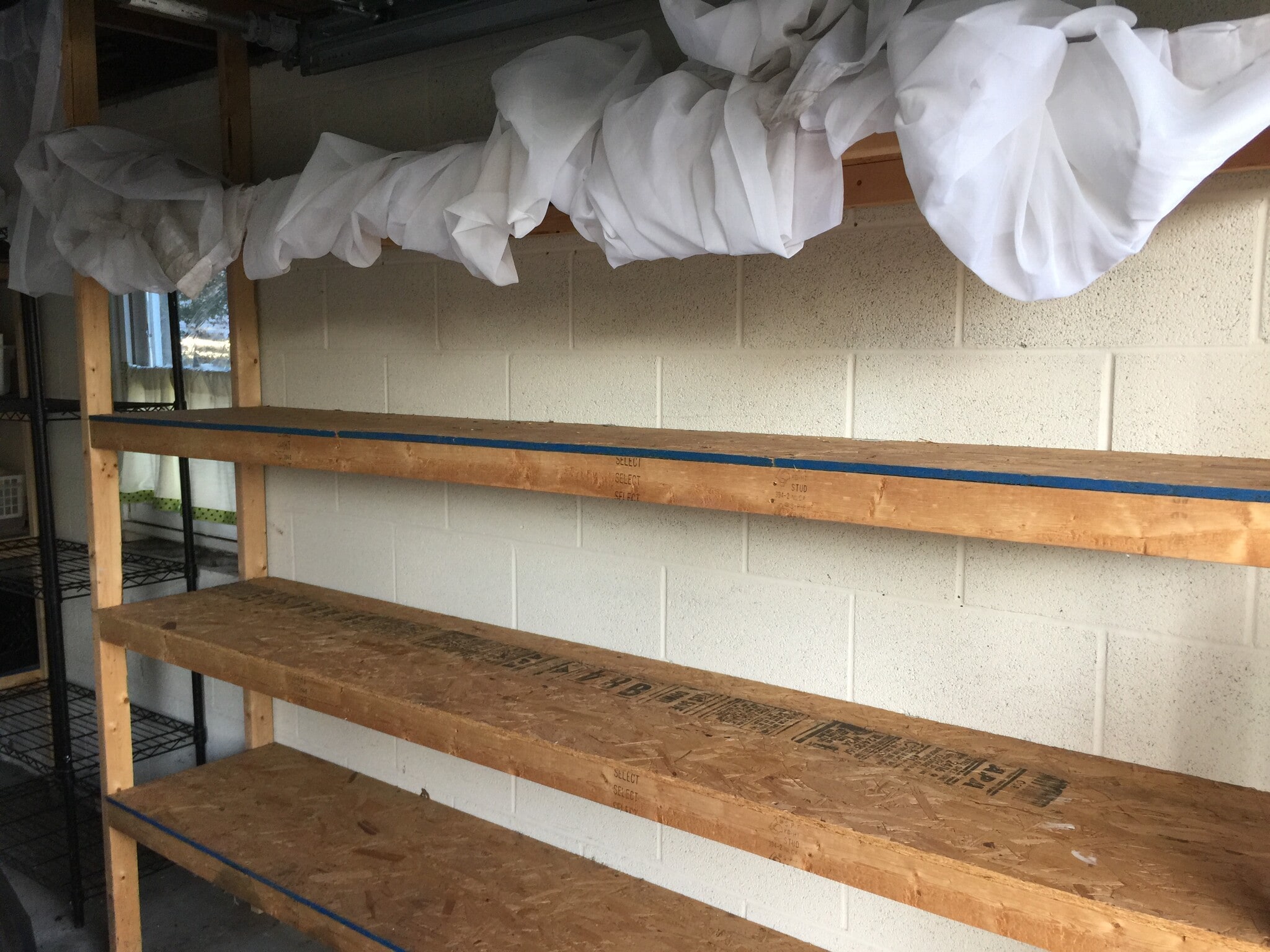 Check out garage storage! Hide stuff behind sheers, provided - 7288 Beechtree Ln