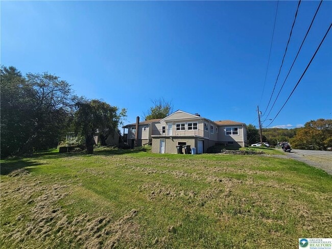 Building Photo - 6123 3rd Ave