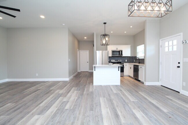 Building Photo - Fully Remodeled 2BR/2BA Attached Home with Garage, Modern Finishes, Park Views & Prime Downtown P...