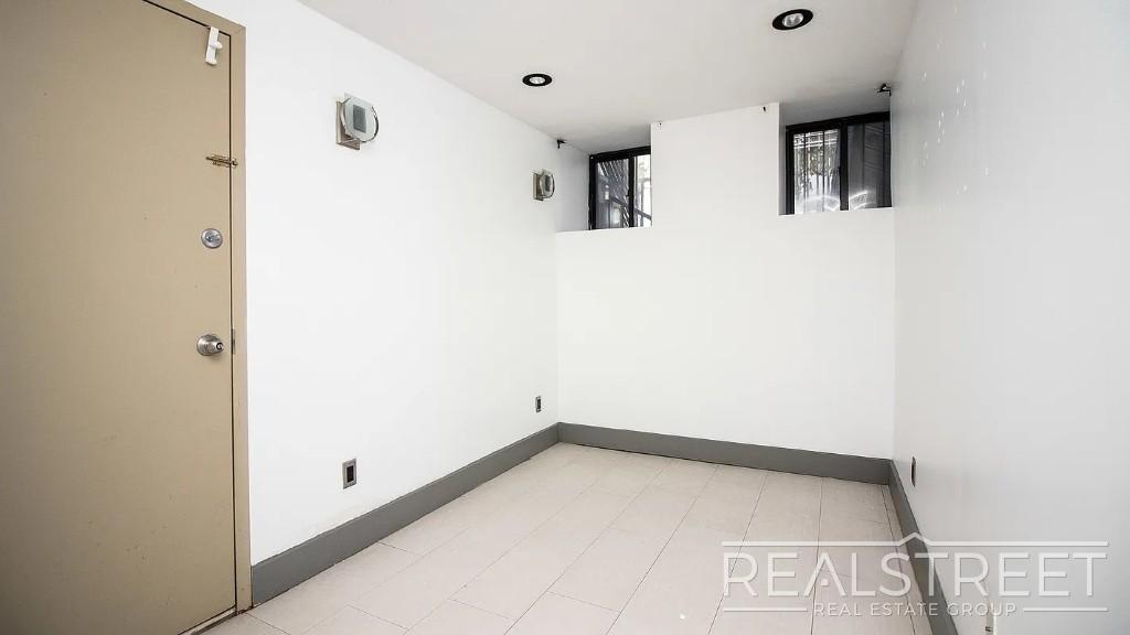 Building Photo - Gut-Renovated 3BR + Massive Finished Basement | Backyard, Laundry & HVAC | Bushwick