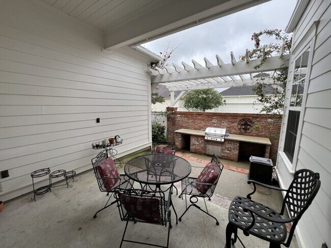 Building Photo - Luxury 4BR Home in Americana | 11 Ft Ceilings, Courtyard Living & Furnished Option at $3,950