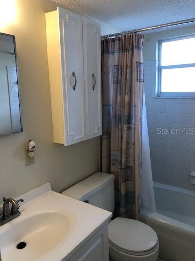 Building Photo - AVAILABLE OFF SEASON FOR $1,800/MO