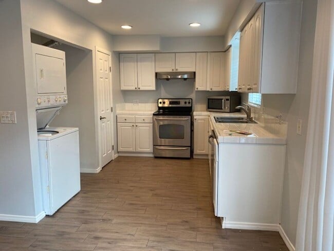 Building Photo - **Coming Soon ** Spacious 4-Bedroom Townho...