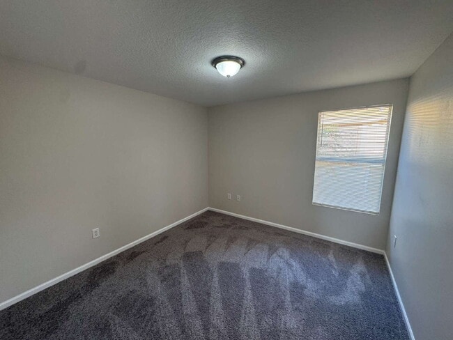 Building Photo - "Spacious 4-Bedroom Home with 2 Full Baths...