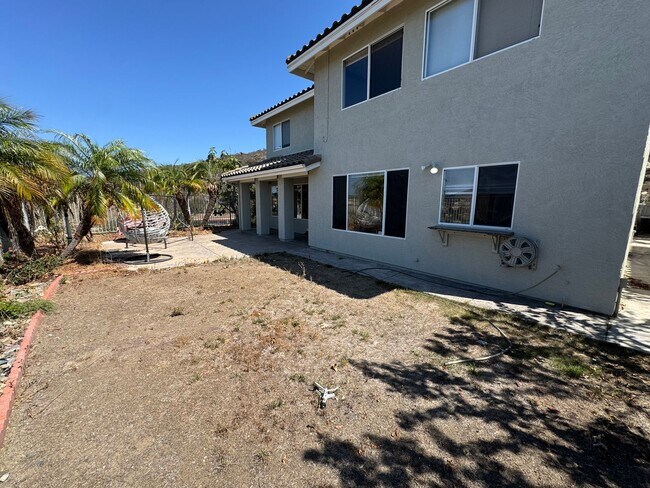 Building Photo - Gorgeous for 4 Bedroom and gated community
